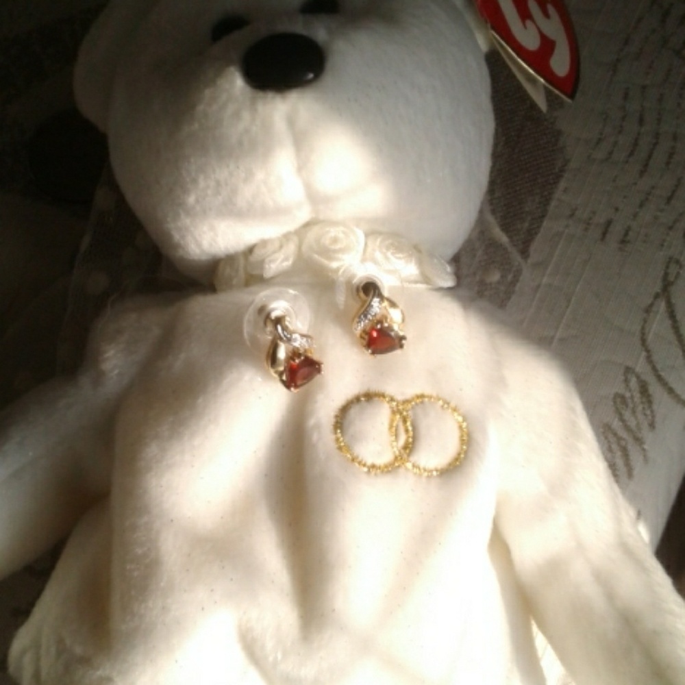 10k gold ruby  earrings.